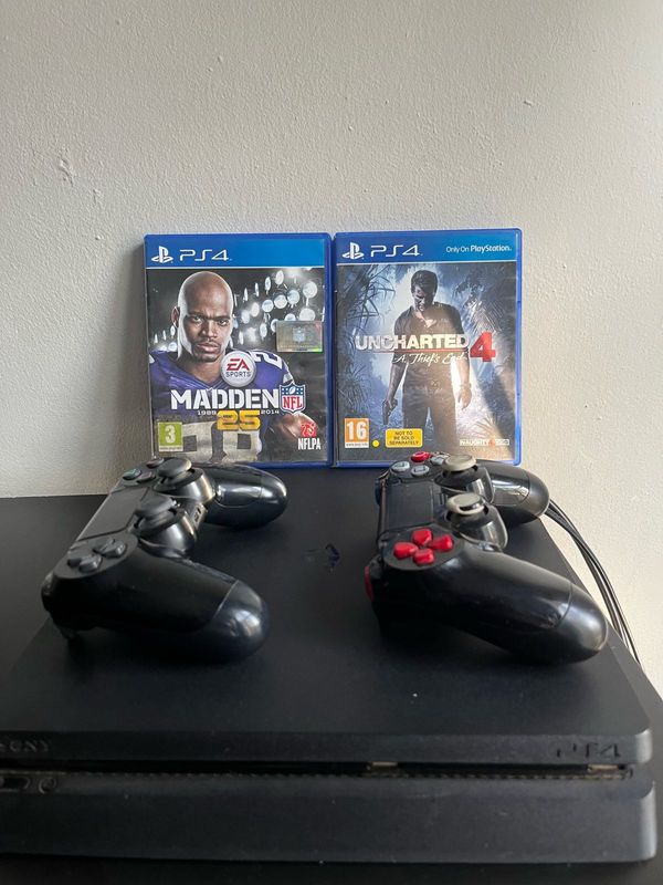 PS4 with 2 controllers and 2 games for sale