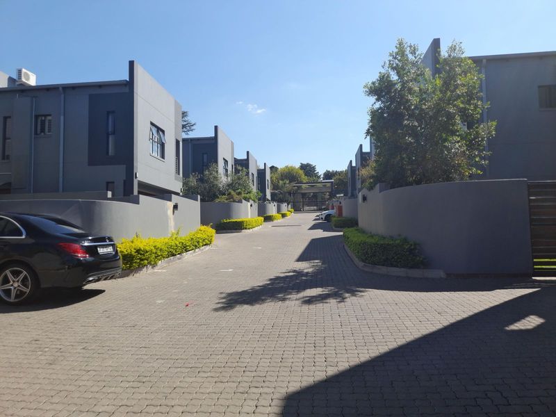 Nestled in the heart of Bryanston  in an upmarket complex  with  24 hour guarded security