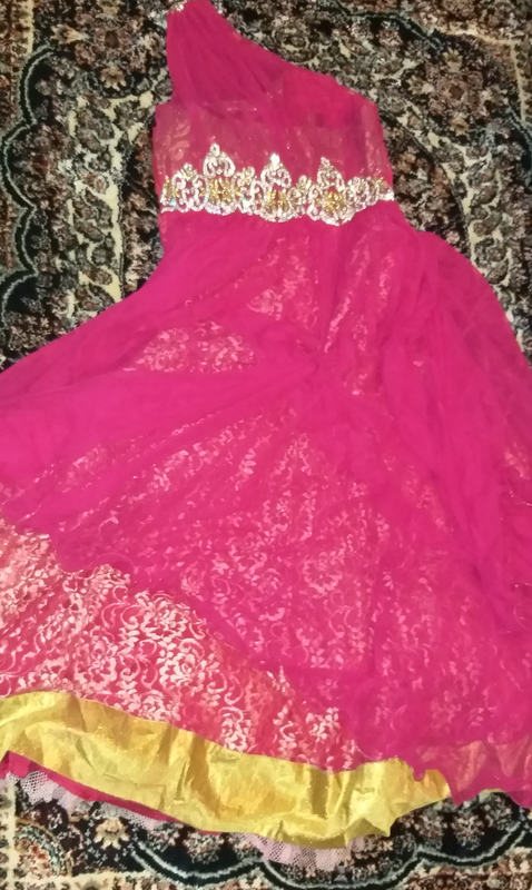 Elaborate Pink Dress with Ruffles