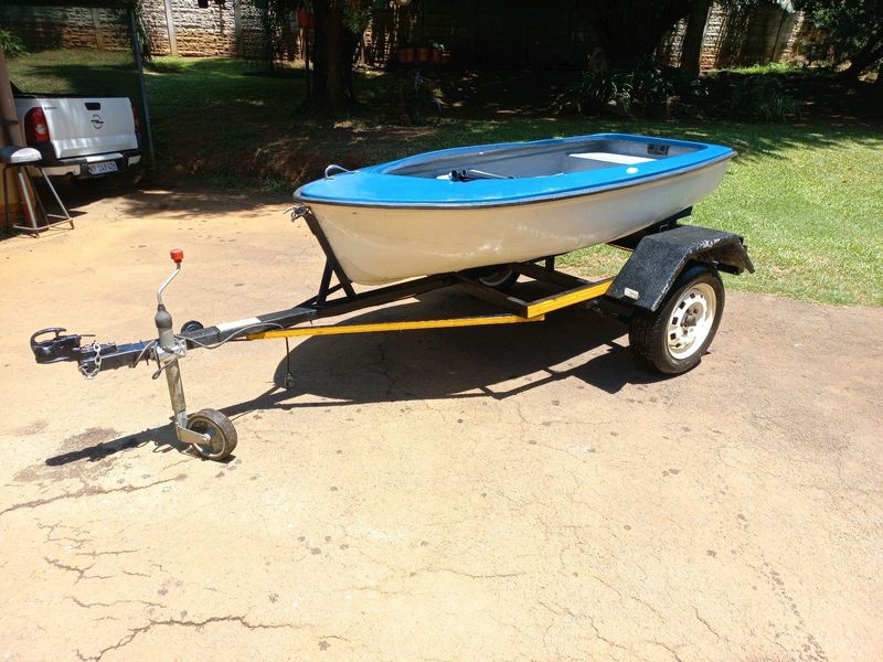 Small Bass boat on trailer. No motor