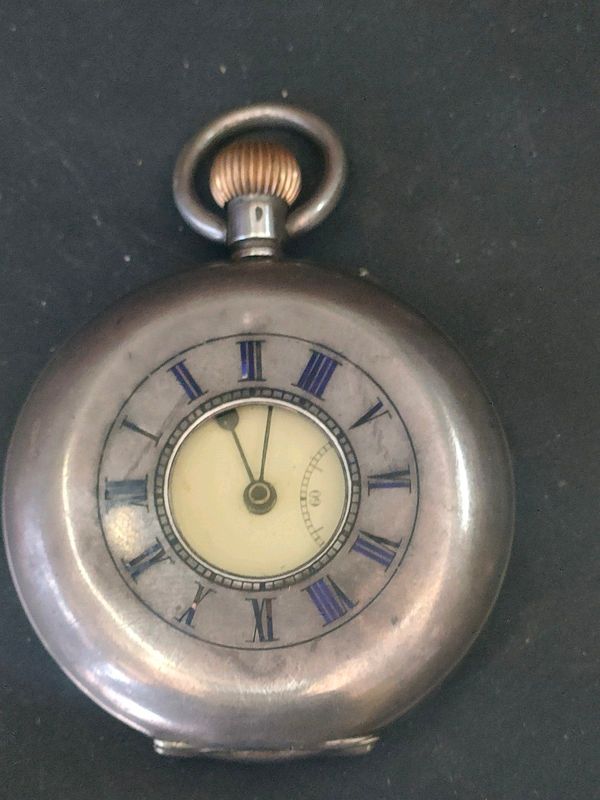 Antique silver pocket watch and silver chain