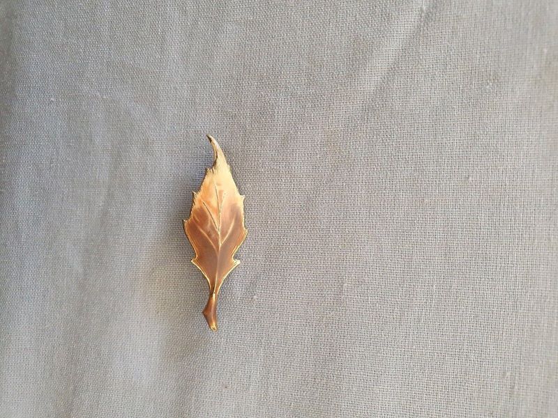 Golden leaf brooch