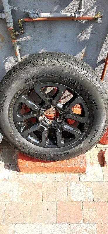 Toyota legend rs rim with good used tyre 265/60/18 to use as spare