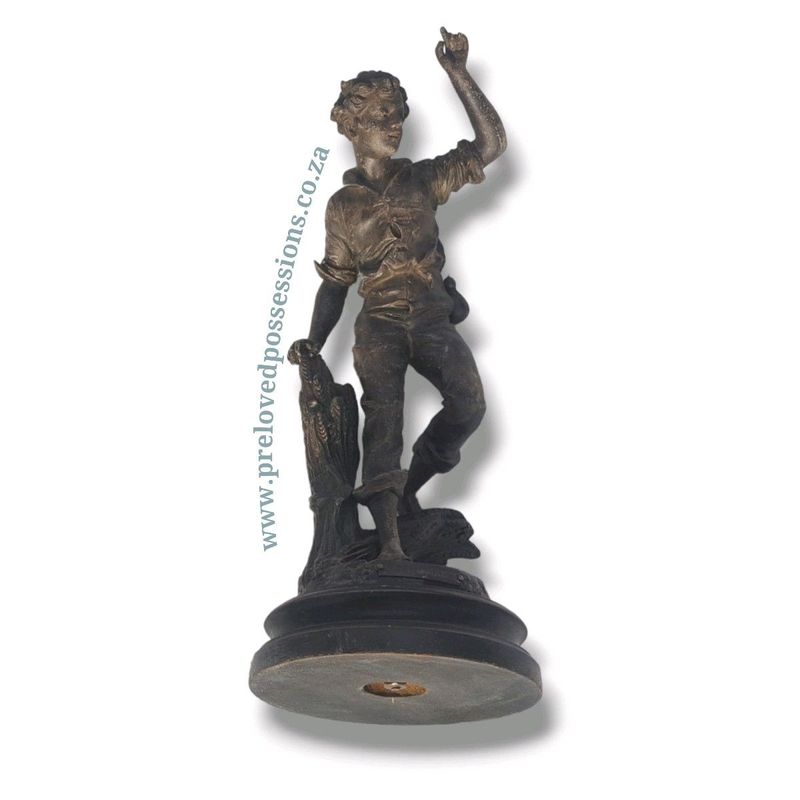 Spelter boy figurine