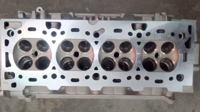 THE CYLINDER HEAD IS BARE FOR CHEVROLET SONIC AVEO F16D4 AVAILABLE IN STOCK CONTACT ME.