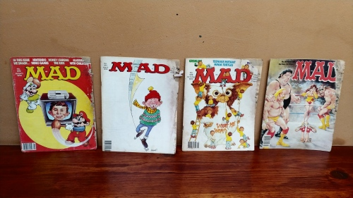 Collection of 4 old Mad comics.