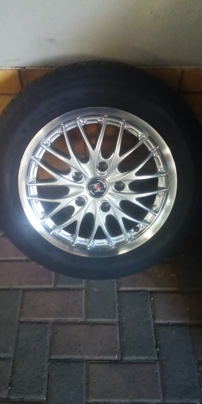 Brand new 15&#34; 5x120pcd BMW magwheel  fitted with used 185/65r15 Roadking tyre.