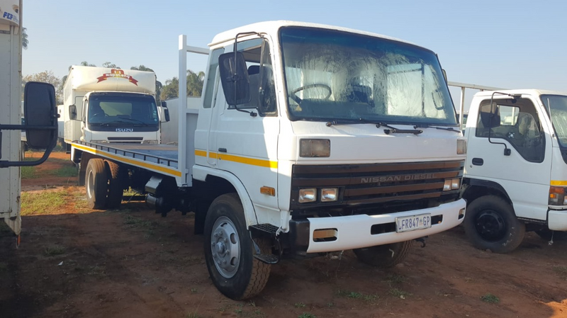 1995   NISSAN CM16 FLATBED TRUCK FOR SALE (T2)
