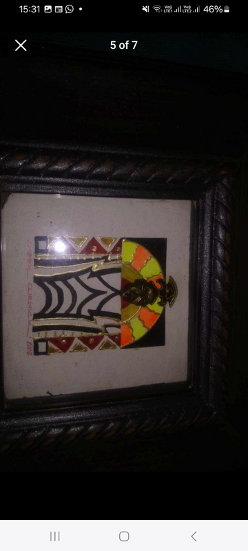 Framed Art By Cheryl Churnick Buddha Tribal  in a dark hardwood frame.Both in excellent condition