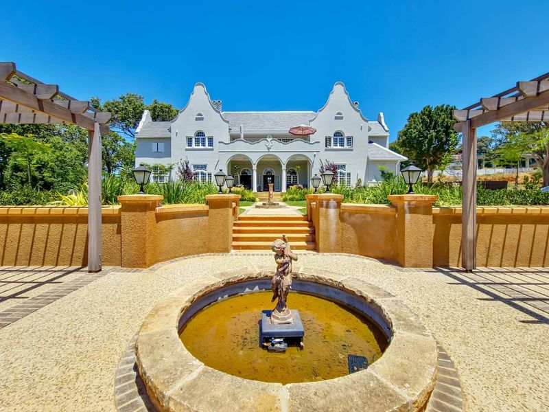 Historical Charm, Modern Comforts, and Secure Living in one-of-a-kind estate in Upper Claremont