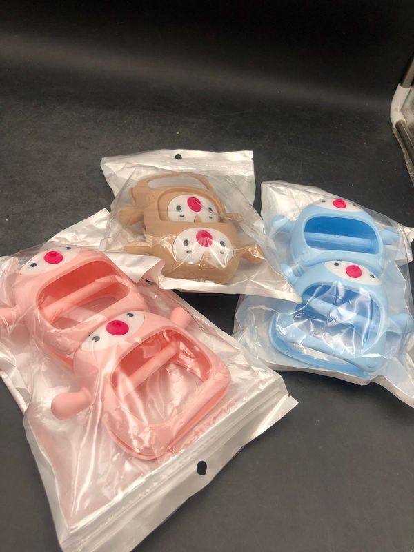 Nearly New BPA Free Silicone Never Drop Penguin Teether For Babies - Pink - 3-9 months -