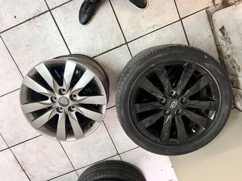 Kia Wheels and rims - Two wheels with Two black  rims - Two rims on its own - 1 silver one Black