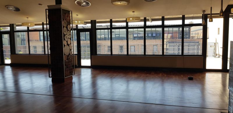large space open space with mezzanine level offices in Melrose Arch