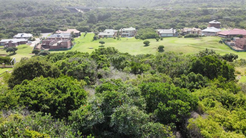 Stunning vacant lot hugging a stroke of green belt in Dolphins Creek Golf Estate