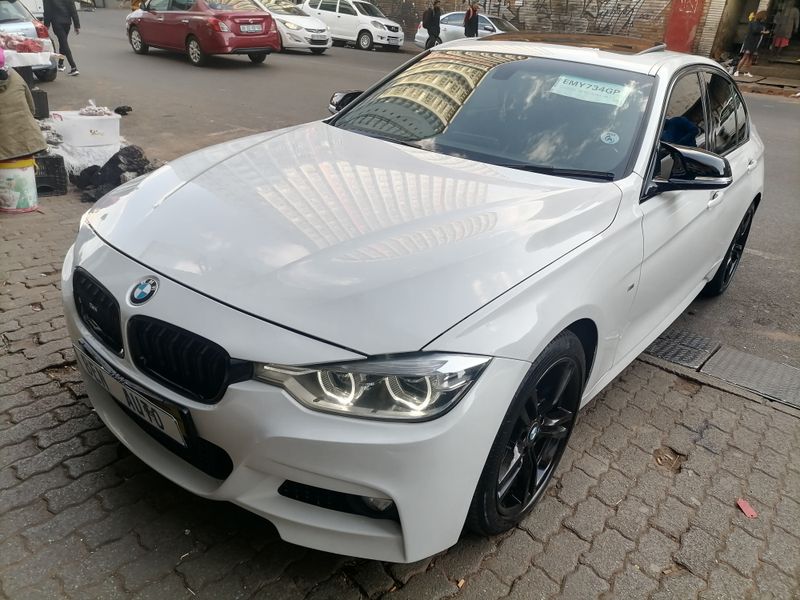 2018 BMW 318i, White with 40000km available now!
