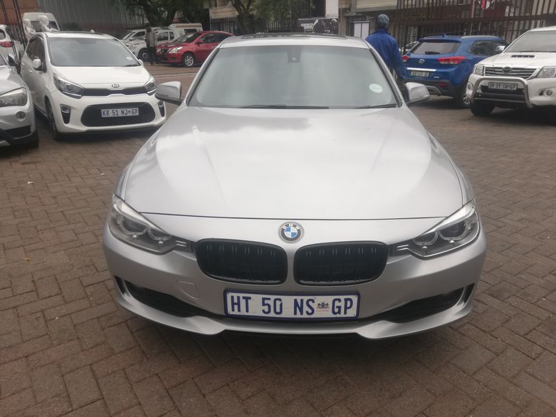 2014 BMW 320i Exclusive, Silver with 85000km available now!