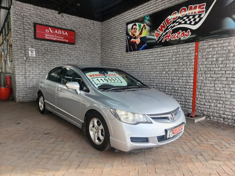 SILVER Honda Civic 1.8 i-VTEC EXi 4-Door AT with 180953km available now!