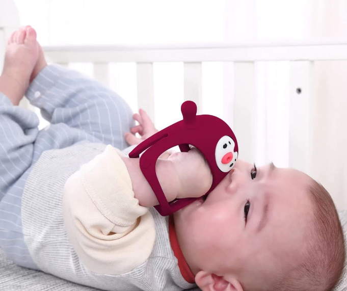 Nearly New BPA Free Silicone Never Drop Penguin Teether For Babies - Red - 3-9 months -