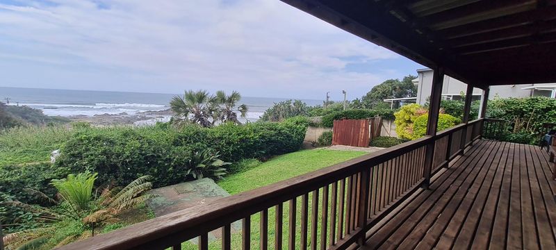 Two bedroom home with magnificent sea and ocean views in Leisure Bay!