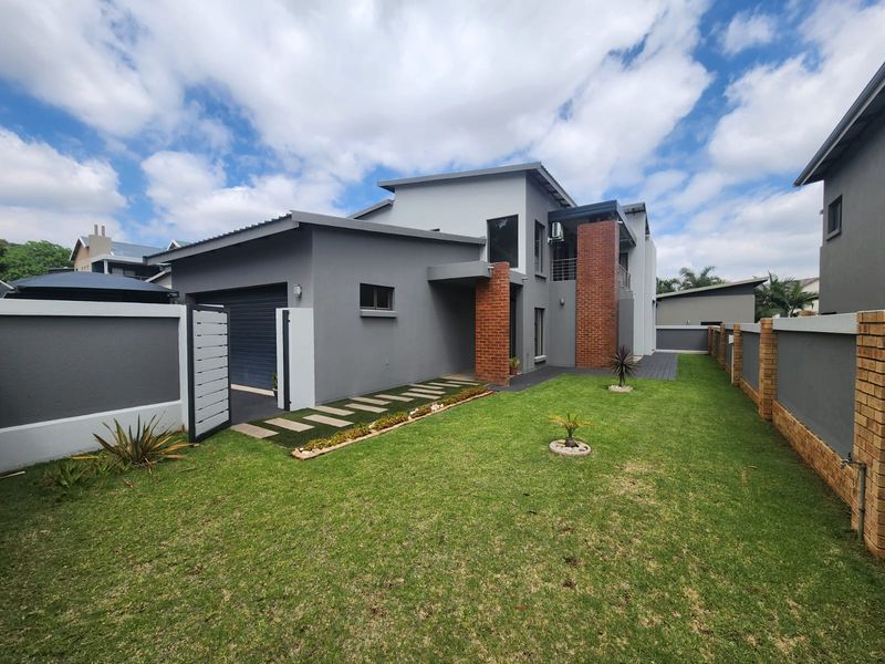 Gorgeous Modern Home in an Up Market Estate