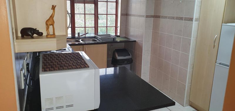 5 LOVELY FURNISHED SELF CATERING GUEST HOUSE APARTMENTS  WITH POOL DSTV INTERNET