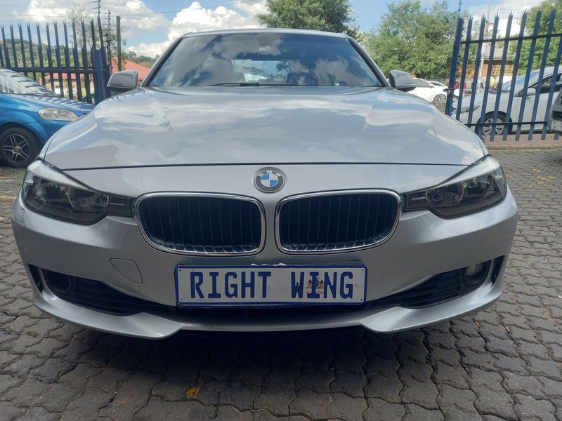 2013 BMW 320i Sport Line, Silver with 93000km available now!