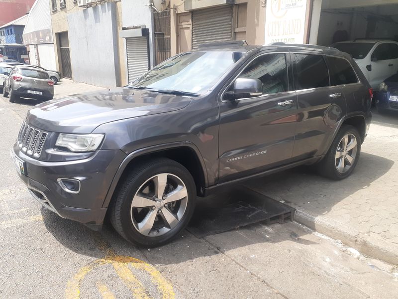 Grey Jeep Grand Cherokee 3.6 Overland AT with 168000km available now!