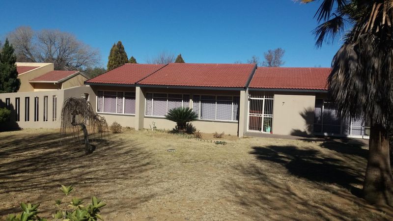 Specious neat property with 5 uotside Bedroom each with carport for investment, Already...