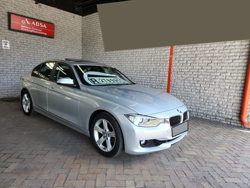 Silver BMW 320i with 76709km available now!