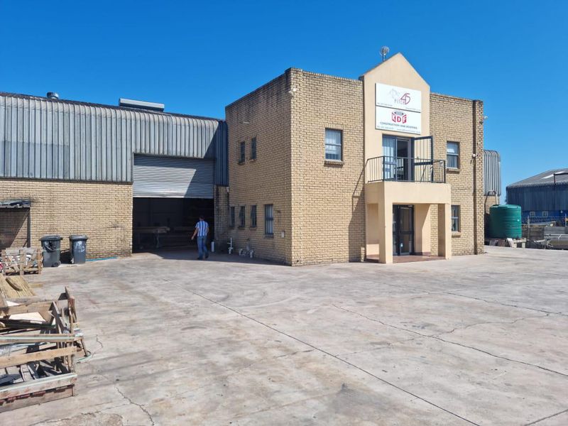 INDUSTRIAL WAREHOUSE WITH NEAT OFFICES AND LARGE YARD AVAILABLE FOR SALE IN STRAND
