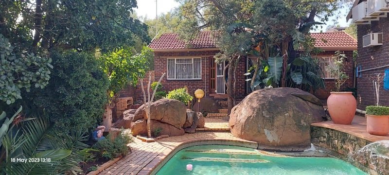 Big and neat 3 bedroom Face Brick house with swimming pool and garden flat