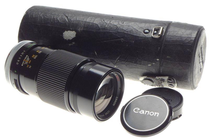 CANON lens FD 300mm 1:5.6 MINT condition caps and case included with filter fits DSLR 5.6/300