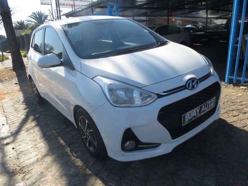Hyundai Grand i10 1.2 Motion, White with 99000km, for sale!