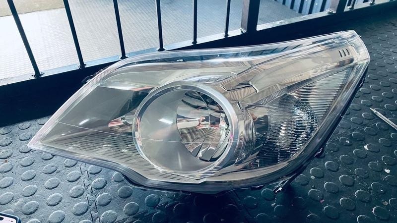 LEFT HEADLIGHT FOR CHEV UTILITY FOR SALE