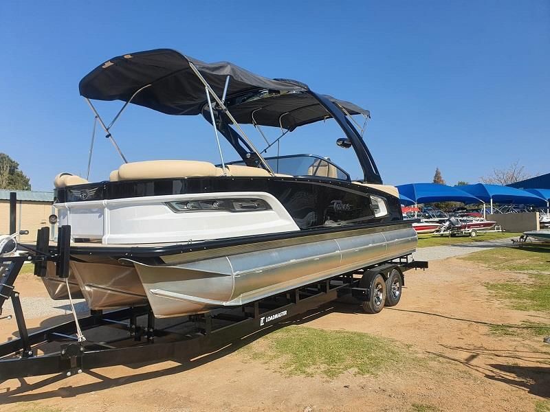 GRAND TAHOE QUAD LOUNGER WITH 350HP SUZUKI OUTBOARD MOTOR.