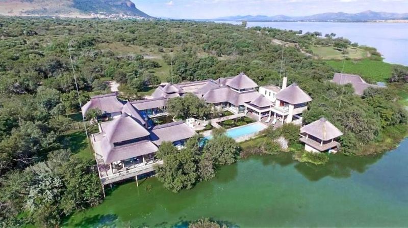 BREATHTAKING THATCH MANSION WITH POND OWNERSHIP &amp; SPECTACULAR VIEWS
