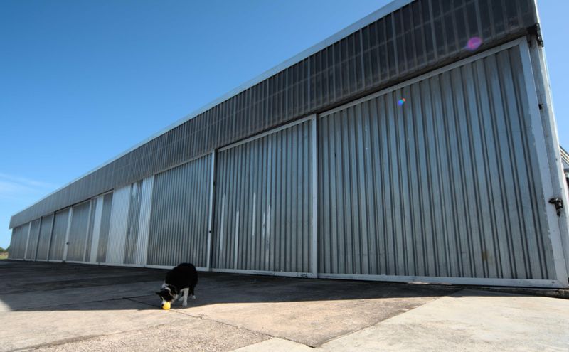 Runway Access with a small hangar for storage or a workshop for sale