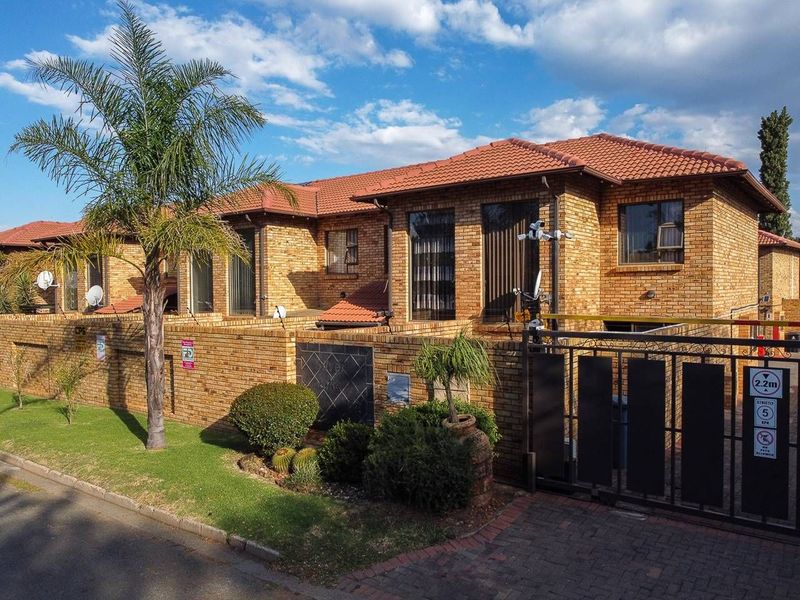 Spotless move in ready facebrick townhouse with full solar system.