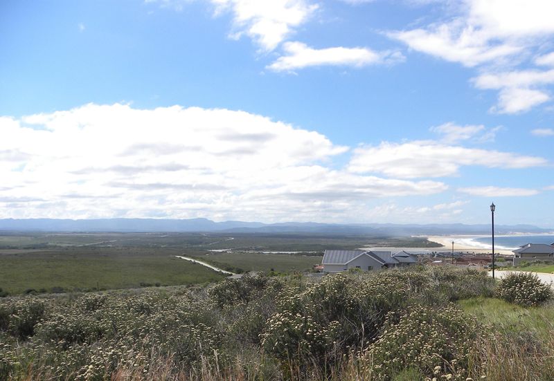 VACANT STAND WITH PERFECT BREAKER, LAGOON AND MOUNTAIN VIEWS IN ESTATE IN JEFFREYS BAY