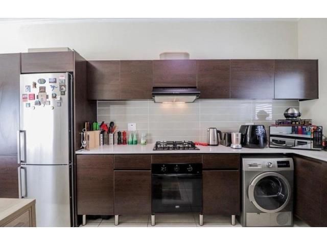 Modern 1st floor 1 bedroom 1 bathroom unit that consists of a shower, toilet and basin