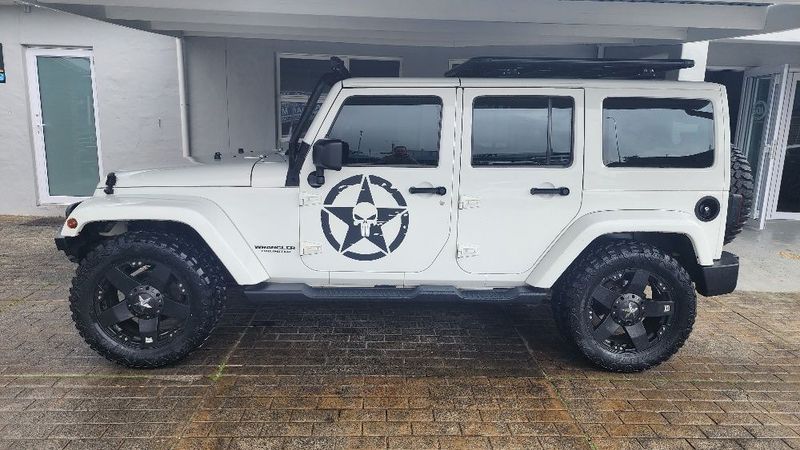 White Jeep Wrangler Unlimited 3.6 Sahara AT with 112000km available now!