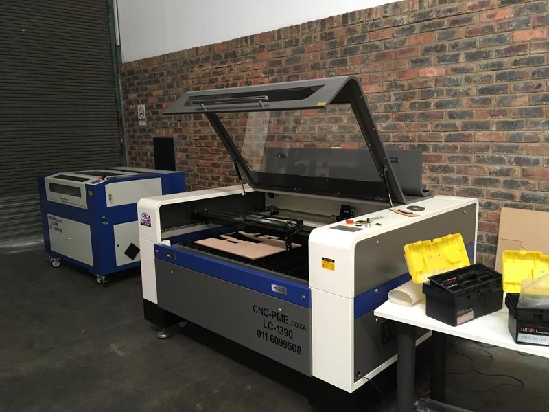 SIGNAGE - CUT WOOD, RUBBER AND PERSPEX - 130W 1390 laser machines