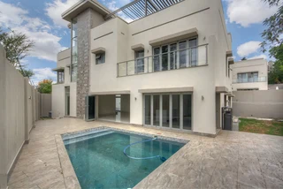 Luxurious 3-Bedroom Exclusive Cluster with Stunning River Views in Bryanston East