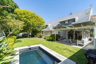 Modern double volume family home with separate cottage.