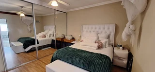 Tranquil 3-Bedroom Townhouse with Private Garden and Dual Carports