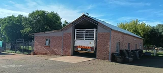 OUTSTANDING SMALL HOLDING. CAN BE USED FOR,GUESTHOUSE,ANY BUSINESS. ANY FARMING,LOTS OF WATER.