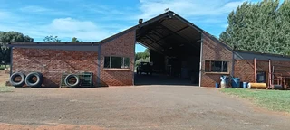 OUTSTANDING SMALL HOLDING. CAN BE USED FOR,GUESTHOUSE,ANY BUSINESS. ANY FARMING,LOTS OF WATER.