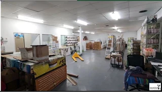 Factory space with high roller shutter entrance situated in a 24-hour security park in Diep River.