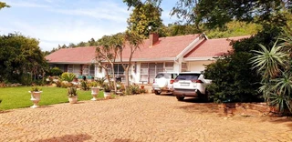 5.55 Ha Plot with Main house and a 2 Bedrooms dometic quarters with Kitchen,Lounge and Bathroom