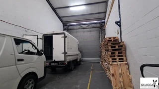 Warehouse with good height,high roller shutter entrance situated 24-hour security park in Diep River